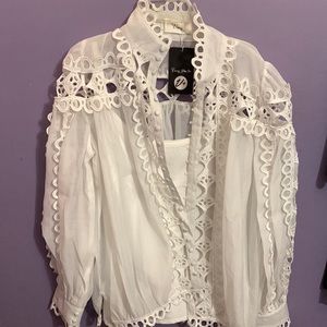 A women’s white two-piece blouse size 1X